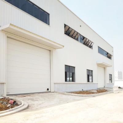 China Double Layer Industrial Overhead Steel Warehouse Sliding Industry Door for sale