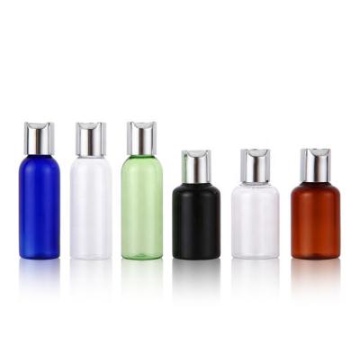 China Hot Selling Eco-friendly Disc Cap Skin Care Bottle Aluminum Plastic Transparent Cylinder Empty Bottle Cosmetic Clear Bottle for sale