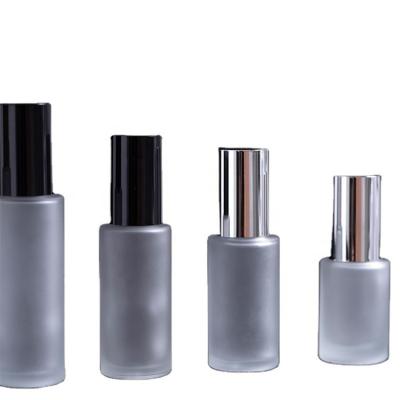 China Opaque Glass Push-Type Cosmetic Bottle Travel Lotion Bottle Sample Recyclable Frosted Portable Bottle for sale