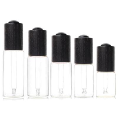 China 10ml 15ml 20ml 25ml 30ml 50ml Recyclable Press The Empty Essential Oil Glass Dropper Base Essence Liquid Bottle for sale