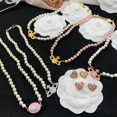 China 2022 Fashion Planet Rhinestone Pearl Necklace And Earring Set Pendant Jewelry Sets For Women for sale