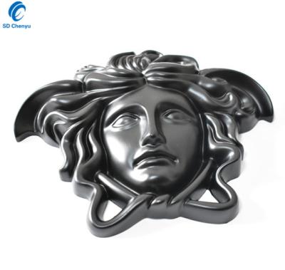 China Modern Bulk Decorative Matt Black Human Medusa Head Shape Label For Furniture for sale