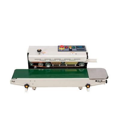 China Horizontal Automatic Continuous Food Band Sealer With Wheeled Printing Solid Ink for sale