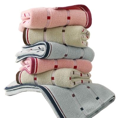 China Compressed Cheap Price Face Hand Towels Hotel Towels Bath 100% Cotton Towel for sale