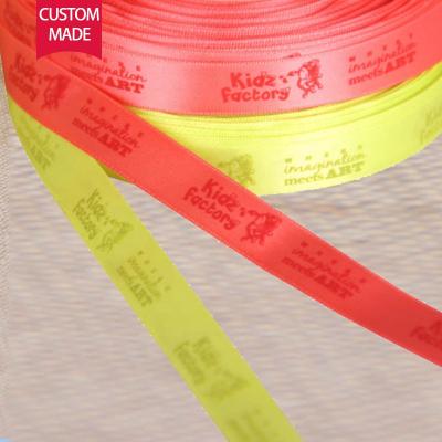 China Eco Fridendly high quality colorful red ribbon with printed red embossing logo for Flora/box for sale