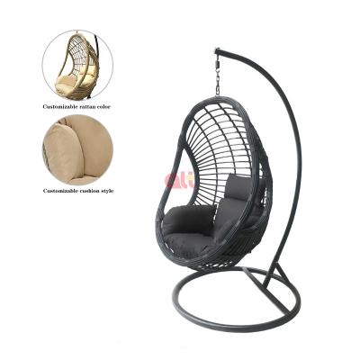 China Waterproof Folding Rattan Husk Hanging Chair Relaxing Black Egg Chair Hanging Garden Chair Manufacturer for sale