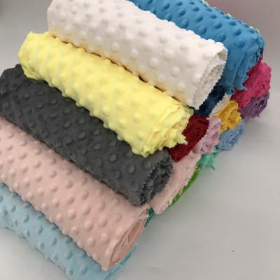 China Flame retardant 100%Polyester bubble embossed super soft minky dot fabric for garment for sale