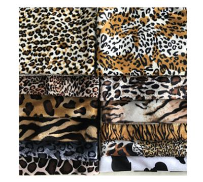 China Anti-Static Bedding S Wave 100% Polyester Upholstery Animal Pattern Velboa Fabric for sale