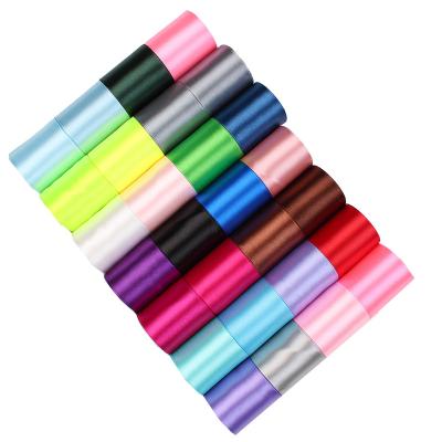 China Factory Price Durable Polyester Satin Colored Double Faced Ribbon On Roll For Packages for sale