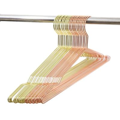 China Sustainable Fashionable Metal Wire Rose Gold Hangers Stand For Clothes Hook And Coat Hanger Dry Cleaning for sale