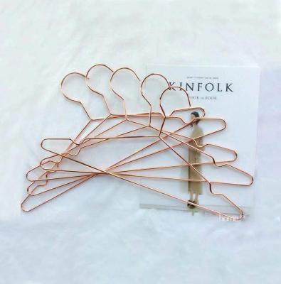 China Popular Cloth Protector Sales Metal Top Wire Rose Gold Laundry Hanger Rack for Clothes and Hanger Coat Hook Dry Cleaning for sale