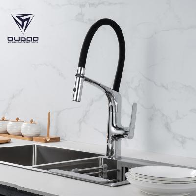 China Flexible Modern Silicone Pull Out Kitchen Sink Faucet Brass Water Mixer Tap for sale