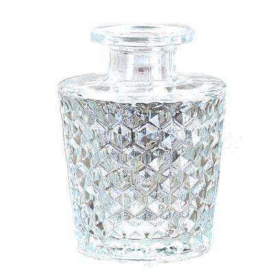 China Not easy in the fresh embossed glass vase not easy to deformation ornaments deformation vase household in the desktop creative Nordic small transparent glass vase for sale