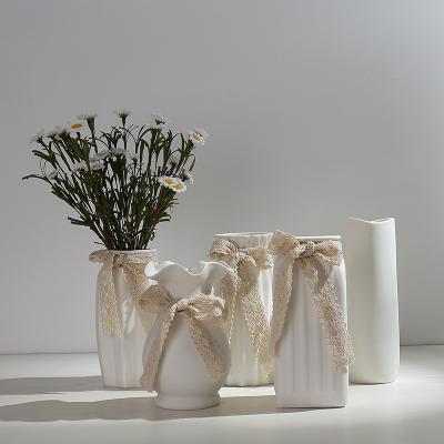 China Not easy to deformation not easy to deformation cheap deformation porcelain bottle shape glaze ceramic flower vase white for sale