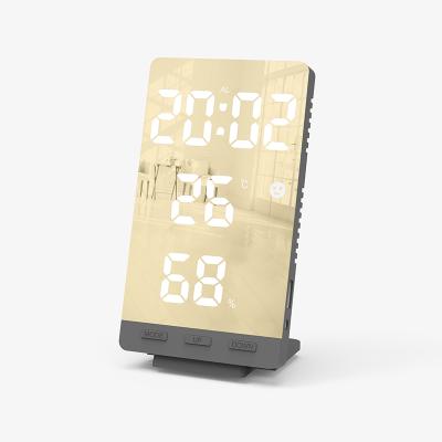 China Antique Style Hygrometer andThermometer LED Mirror Alarm Table Wall Clock Nap Night Fashion Ultra Thin Clock for sale