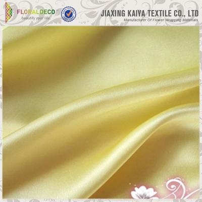 China Large Material Anti-Static Cheap Bright Yellow Satin Fabric Swatches for sale