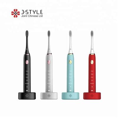 China Sonic Battery Operated J Style Vibration Electric Toothbrush Adult Smart Head for sale