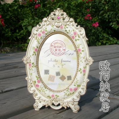 China Vintage Style European Style Carved Classic Oval Home Photo Frame Retro Decorative Photo Frame for sale