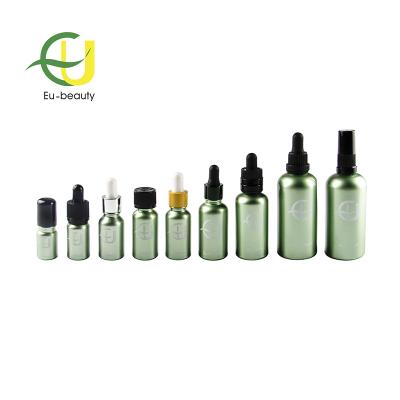 China Personal Care 5ml 10ml 15ml 20ml 30ml 50ml 100ml Green Color Coating Glass Dropper Bottle for sale