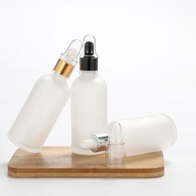 China Cosmetics Matt Frosted Clear Black, and Green Glass Bottle 10ml 15ml 20ml 30ml 50ml 100ml Dropper Bottle for Essential Oil/ for sale