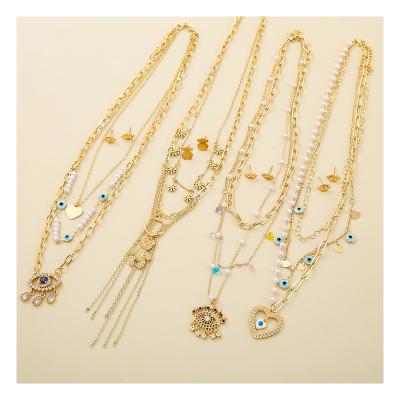 China Romantic New Arrive Lucky Evil Eye Necklace With Link Chain Girl Multi Layer Heart Brass Bead Dangling Earring for sale