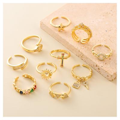 China Peggy Factory New Original Designer Ring Adjustable Diamond Gift Lucky Star Brass Romantic Cross Ring for sale