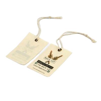 China Other Wholesale Custom Printed Logo Paper Garment Hang Tag Labels Clothing Hang Tags With String for sale