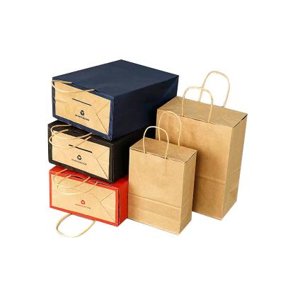 China Recyclable Wholesale Custom Printed Favor Bag Modern Design Gift Box Handle Bags Birthday Party Tote Bags for sale