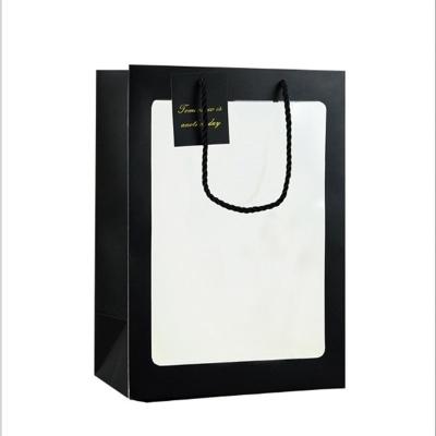 China Recyclable Wholesale Custom Printed Favor Bag Chocolate Flowers Gift Bag With Transparent Window Paper Gift Bag for sale