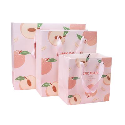 China Wholesale Recyclable Custom Printed Peach Green Lemon Pattern Fresh And Beautiful Portable Paper Shopping Bag for sale