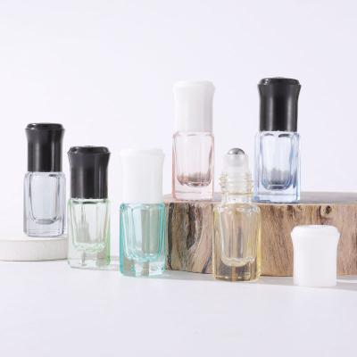 China 20ml Cosmetic Stainless Steel Ball Refillable Roll On Bottle Matte Frosted Black Glass Roll On Perfume Bottle for sale