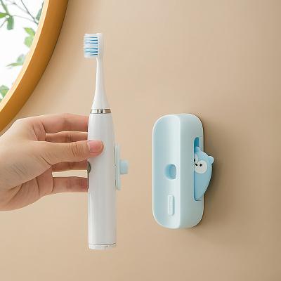 China Wall Mounted Electric Toothbrush Stand Cartoon Toothbrush Holder Wall Mounted Storage for sale