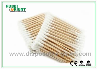 China Productos desechables para el hospital de cabeza simple o doble, hisopos quirúrgicos de algodón de madera en venta