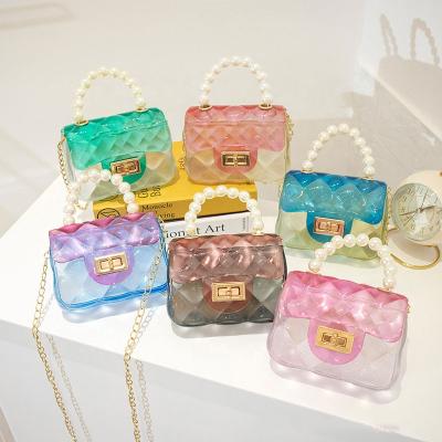 China Fashion Jelly Bag Purse For Girls 2021 Transparent PVC Kids Jelly Mini Purses Candy Sil One Rainbow Cross - Body Bag For Girls for sale