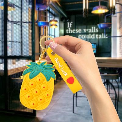 China Sticky Person Sensory Toys Fruit Strawberry Pineapple Bubble Figet Key Chain Toys Coin Clips Mini Soft Silicone Wallet Bags Kids Gift Zipper Card Package for sale