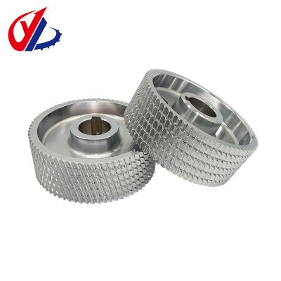 China Woodworking Moulder Top Steel Feeding Wheel Steel Starting Roller For Woodworking Machine Four Side Moulder for sale