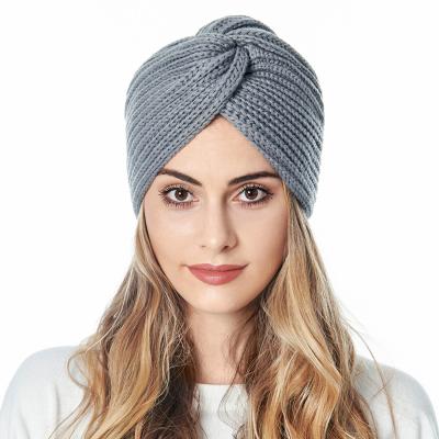 China JOINT European American Muslim Cross Solid Color Autumn And Winter Bowknot Hat Knit Beanie Cap for sale