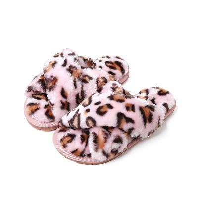 China Fashion Trend Women's Solid Color House Slippers Warm Cross Soft Plush Faux Fur Hairy House Shoes for sale