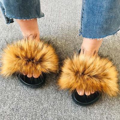 China Fashion Trend Winter Custom Furry Bun Slide Thick Bottom Women's Sandals Luxury Faux Fur Slippers for sale