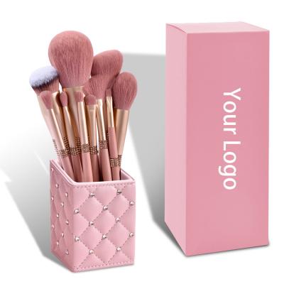 China Angular Blush Pink Wholesale Crystal Handle Makeup Brush 10pcs Kabuki Foundation Brush Set for sale