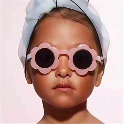 China Wholesale Cute Kids Sunglasses Eyewear Candy Color Flower Transparent Frame Lovely Round Lens AC UV400 Sunglasses For Children Kids Boys Girls 2021 for sale