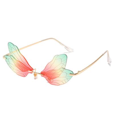 China Dragonfly Wing Shaped Novelty Lens Rimless Sunglasses Girls Ladies Women UV400 Protection PC Lens for sale