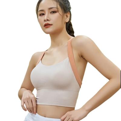 China Breathable Hot Sale Nude Feeling Breathable Sexy Backless Sports Fitness Vest Women Quick Drying Seamless Elastic Comfort Women Yoga Tops for sale