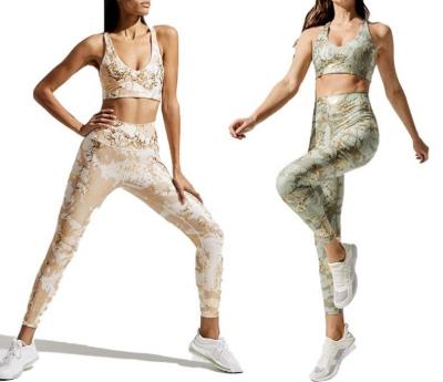 China Fashion Breathable Fitness Split Gold Foil Exercise Yoga Tracksuit Sweatsuit Women Running Leggings And Sports Bra Set for sale