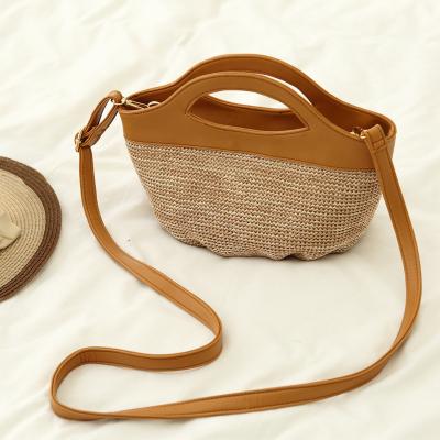 China Wholesale Europe Straw Shell Shaped Bag Fashionable Beachside Handbag for sale