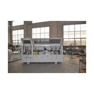 China Building Material Shops Automatic Double Door Dark Edging Machine Woodworking High End Automatic Edge Bander Machine for sale