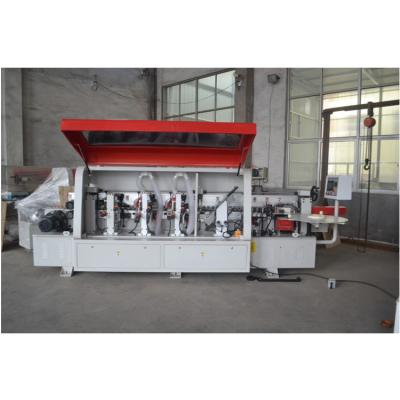 China Building Material Shops Automatic Double Sided Edger Strip Machine for sale