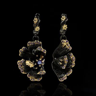 China New retro romantic sunflower earrings high-grade flower zircon character set drill exaggerated double black color black gold female stud for sale