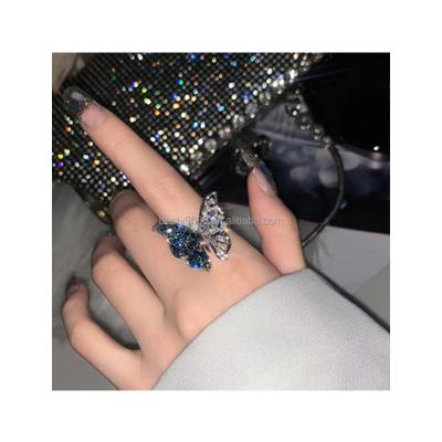 China New HOT light luxury hyperbole luxury diamond inlaid blue adjustable butterfly lady ring opening. Titanium steel does not fade for sale