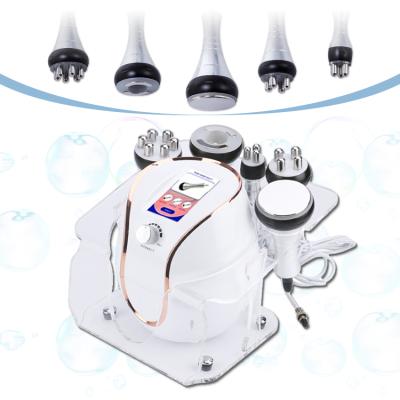 China Portable Ultrasonic Weight Loss RF Cavitation Vacuum Machine 5 in 1 RF Skin Tightening Multifunctional Body Slimming Machine for sale